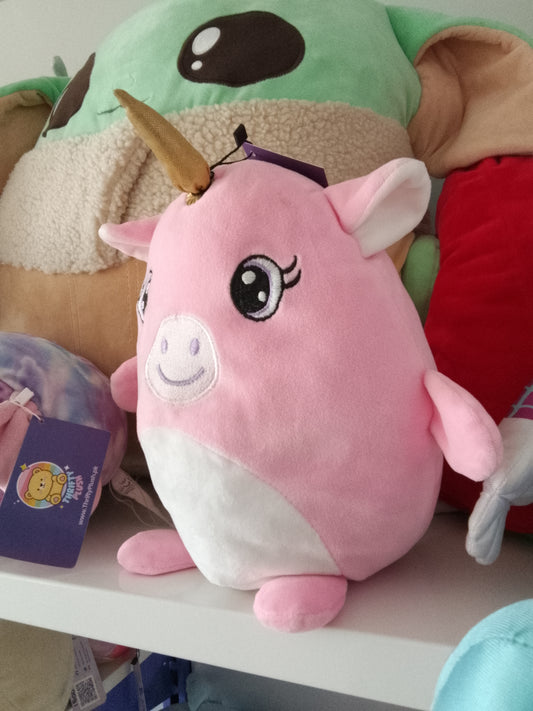 Pink unicorn plush pillow toy.