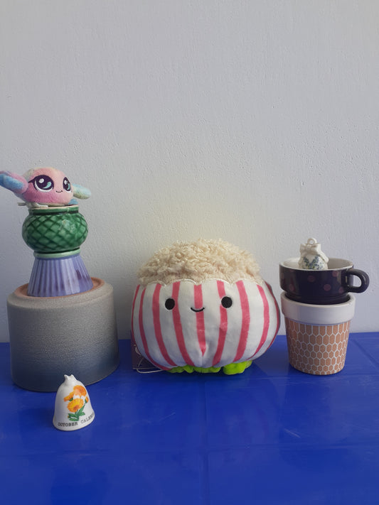 Squishmallow, specifically The "Flip-A-Mallow" Plushie