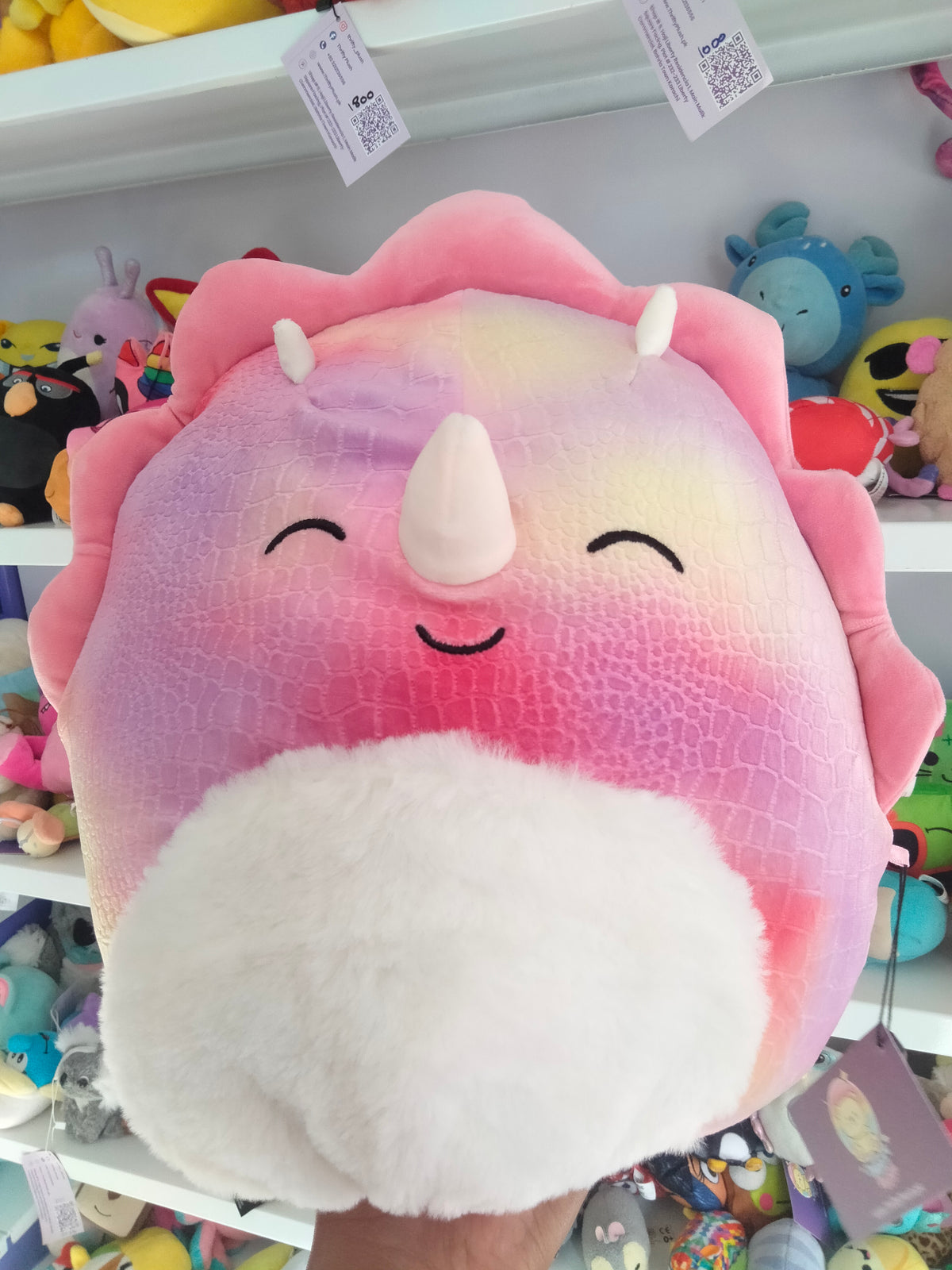 Squishmallows Trinity the Triceratops plush toy.