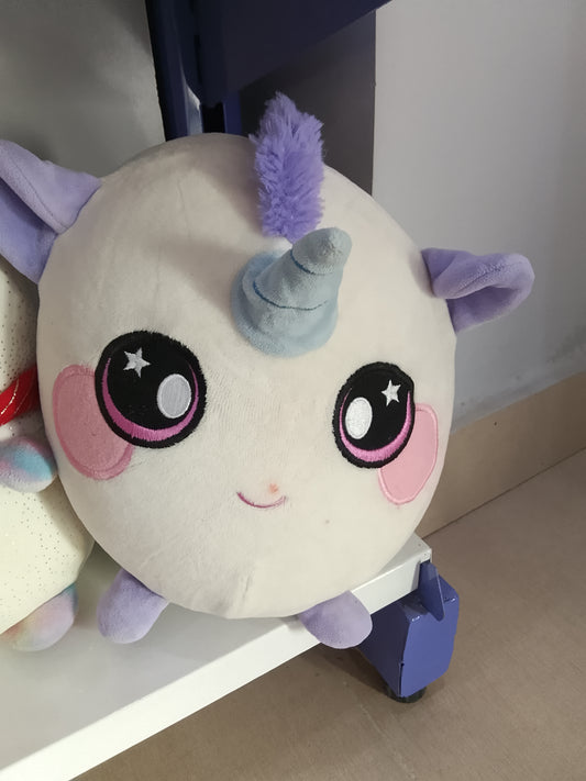 Squeezamals UMA the Unicorn plush toys.