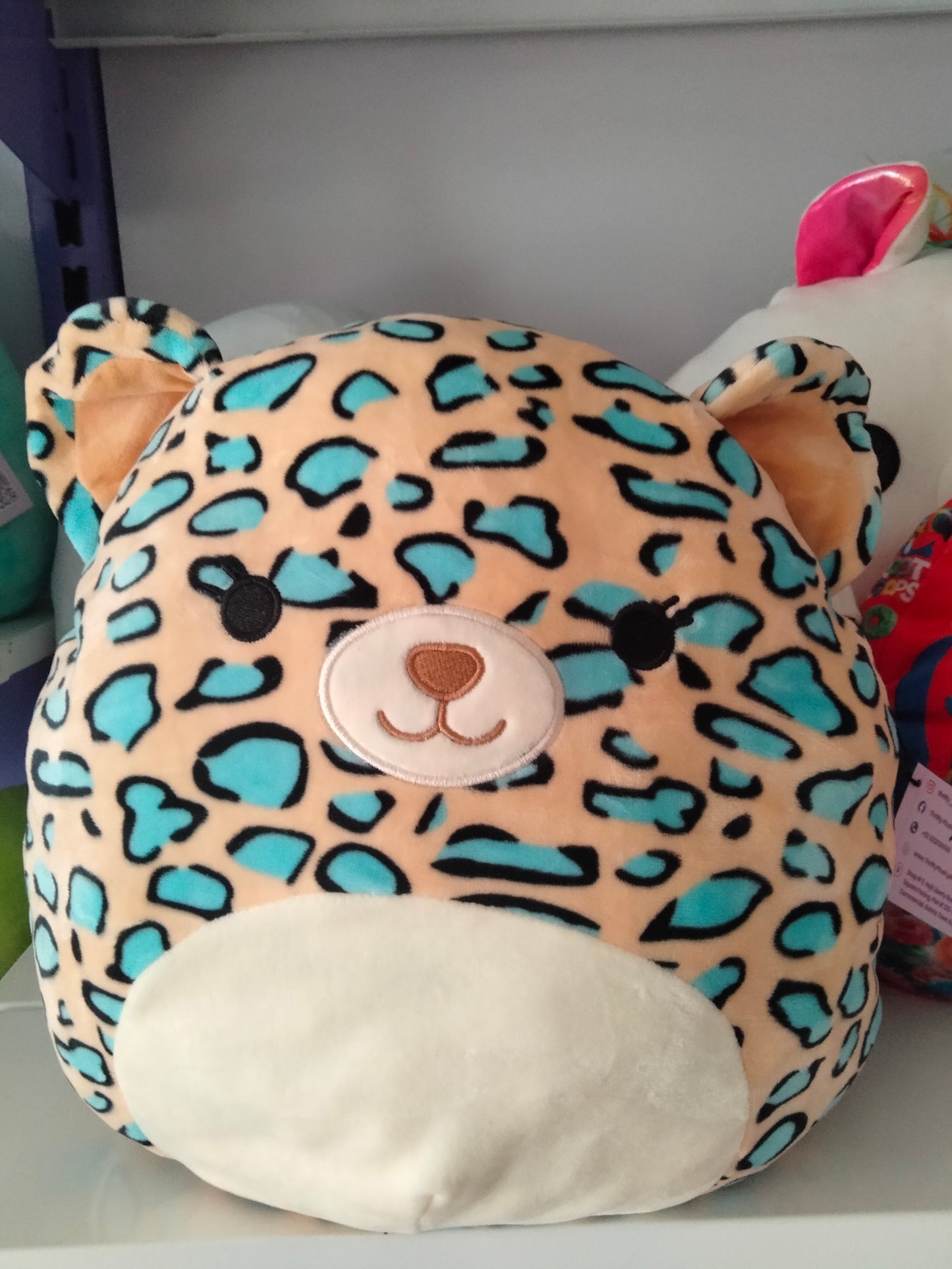 Squishmallows plush toy featuring the character Liv the Teal Leopard.