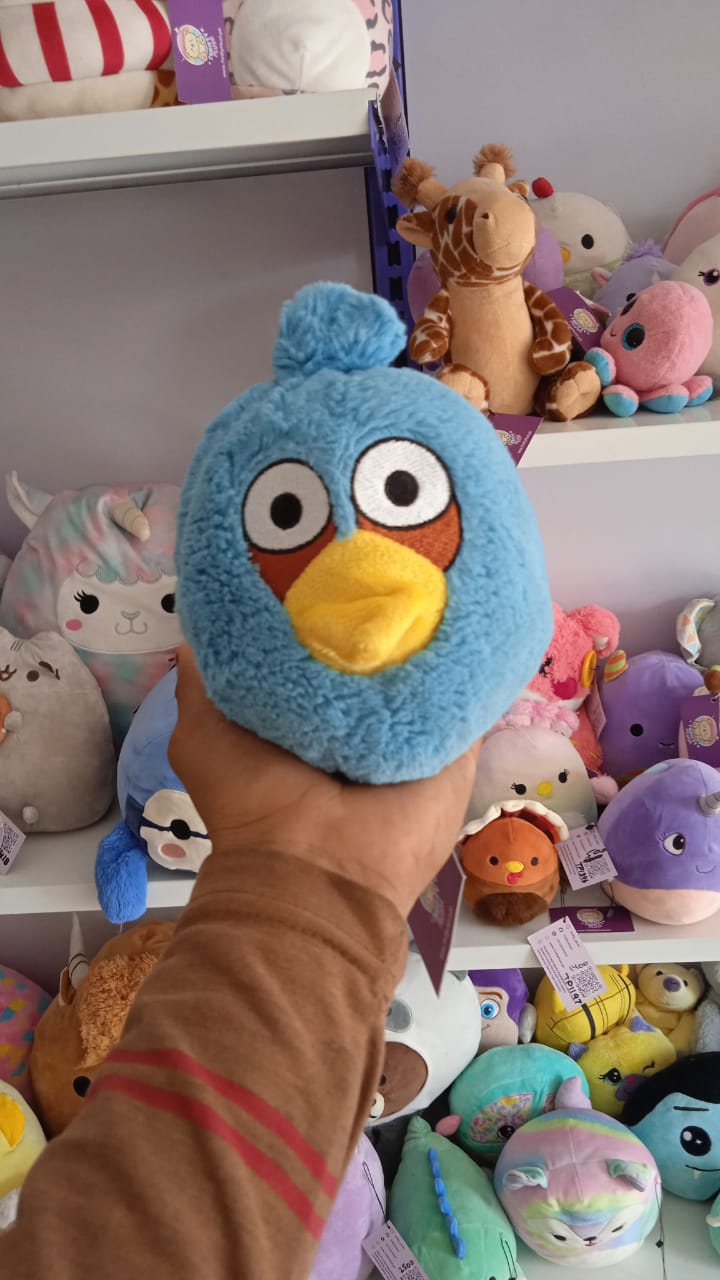 Blue Angry Birds franchise plush toy.