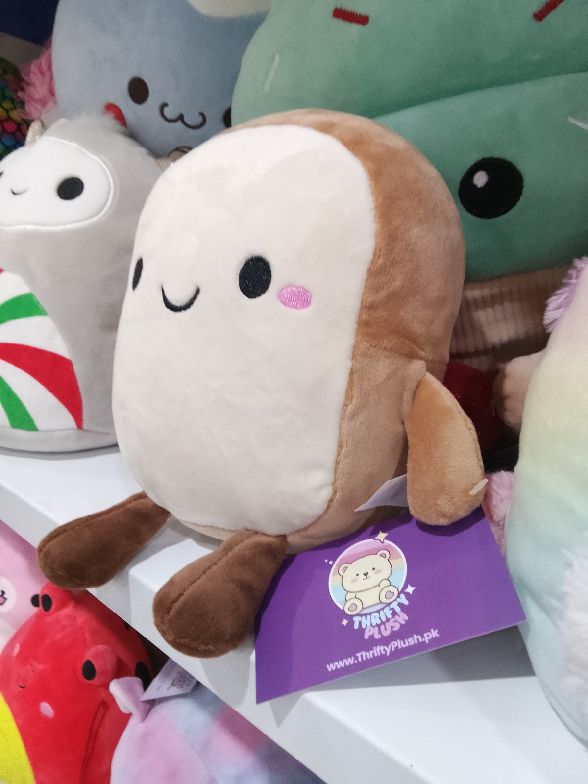 Slice of toast plush toy.