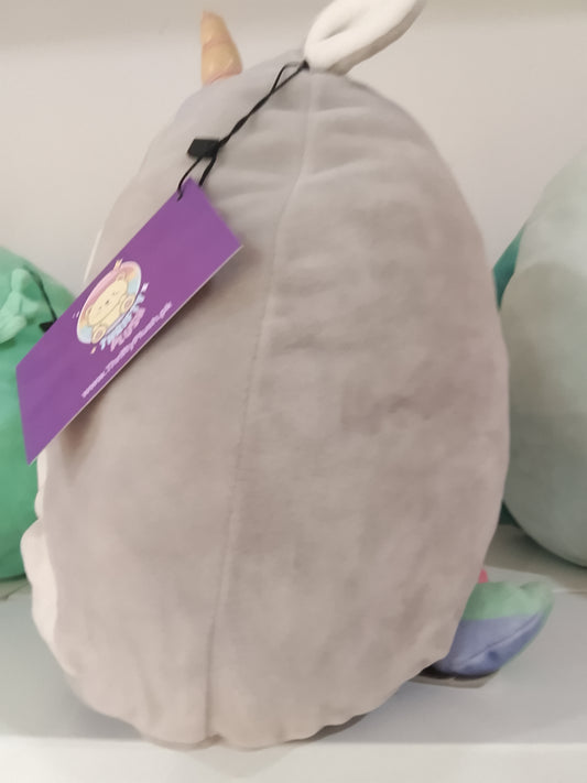 Squishmallows Teresa the Unicorn plush toy light grey body, a white belly, and a pastel-colored mane.