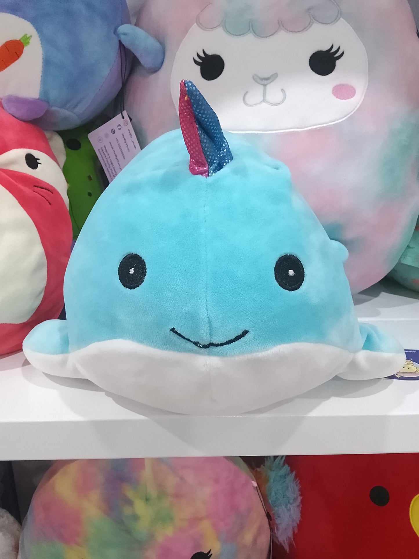 Squishmallows blue Wally the Narwhal plush toy