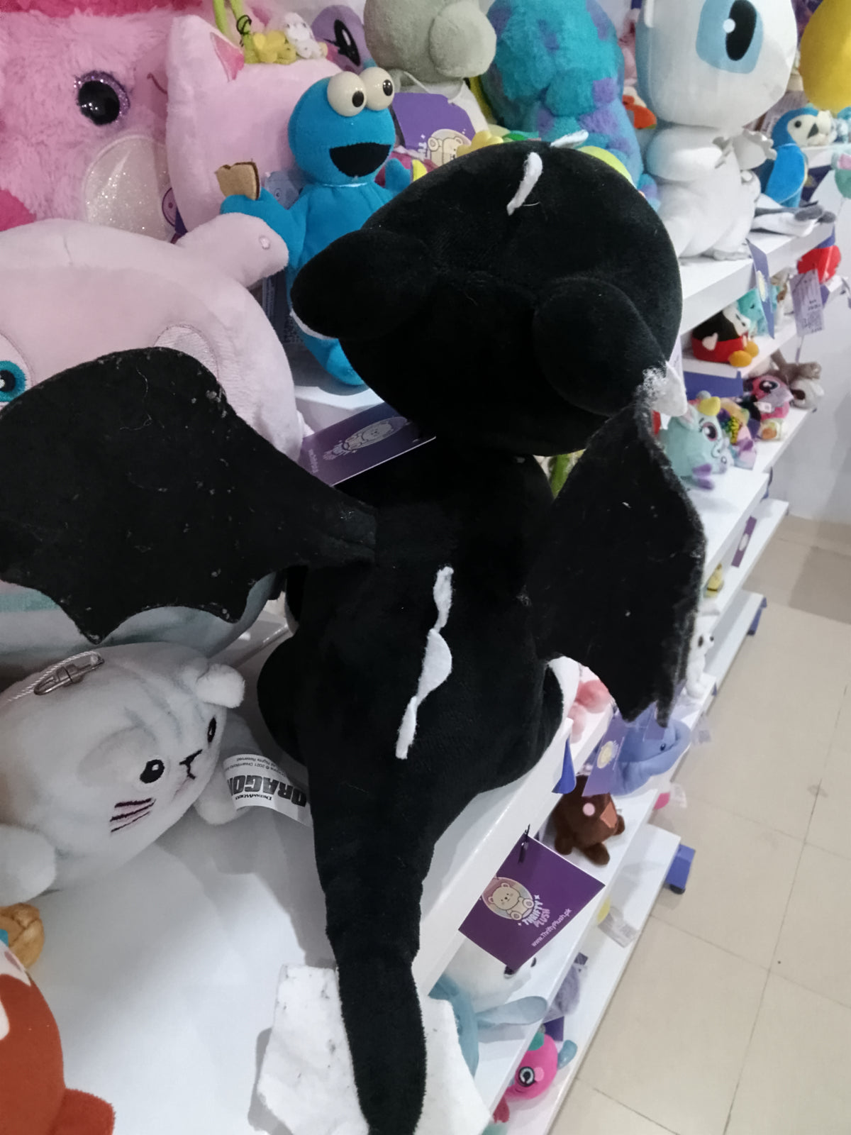 Toothless, the Night Fury dragon from the How to Train Your Dragon franchise plush toy.