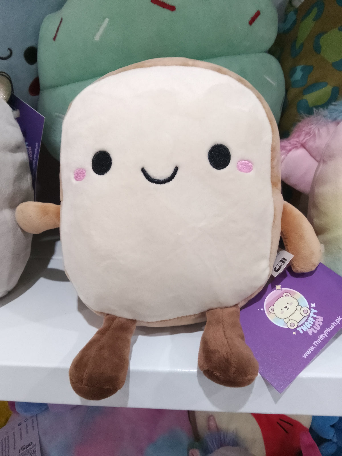 Slice of toast plush toy.