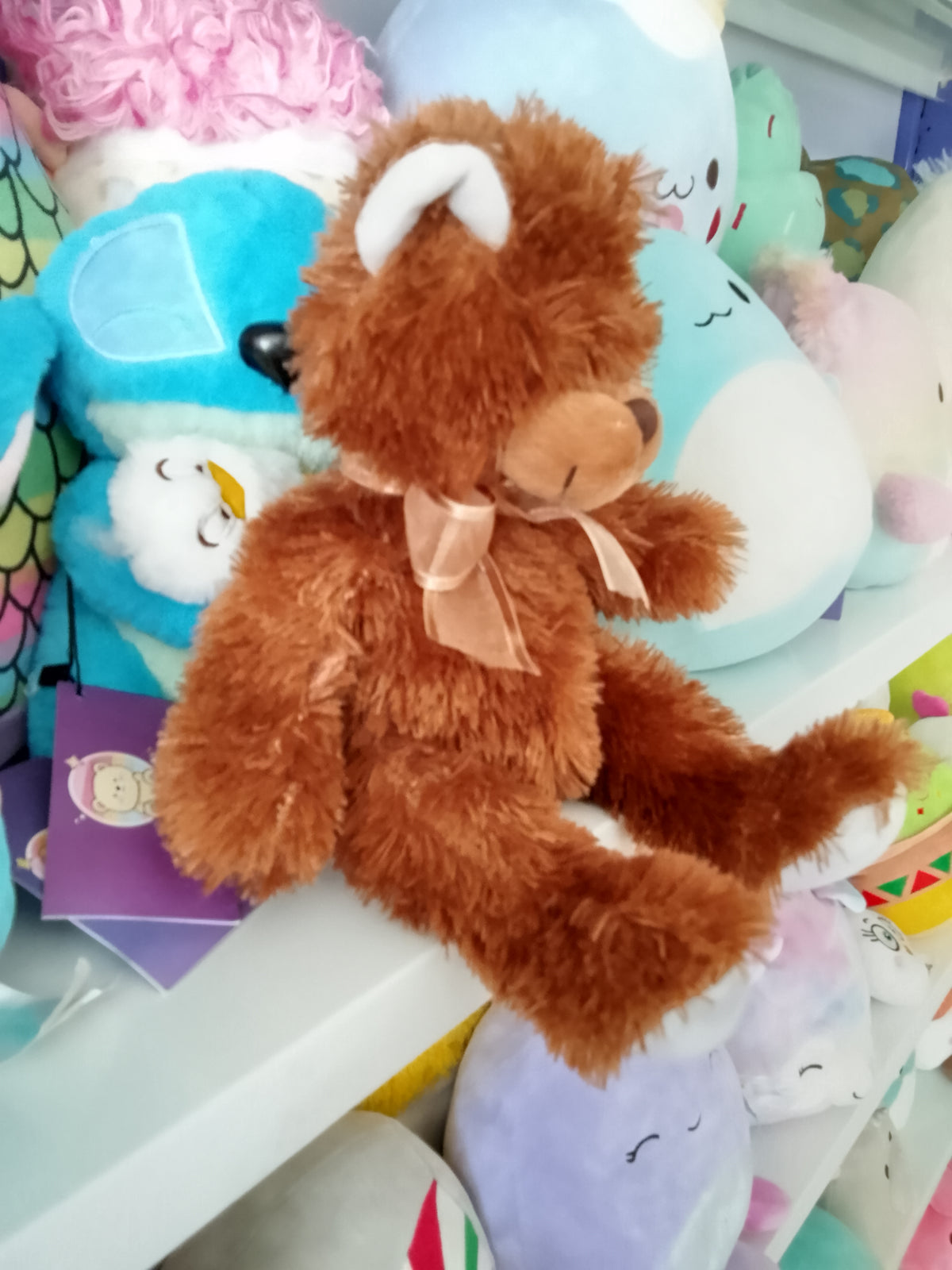Brown Sugar teddy bear plush toy.