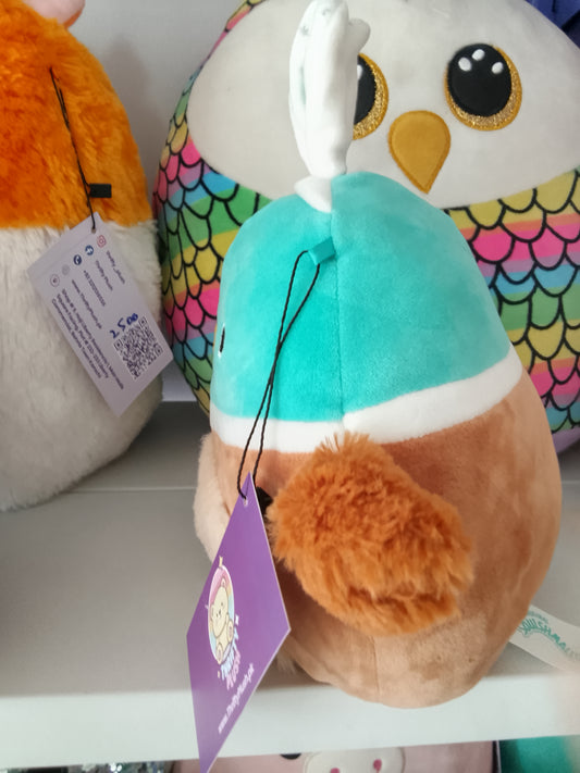 Squishmallows Daksa the Duck Easter plush bunny ears and a fuzzy belly.