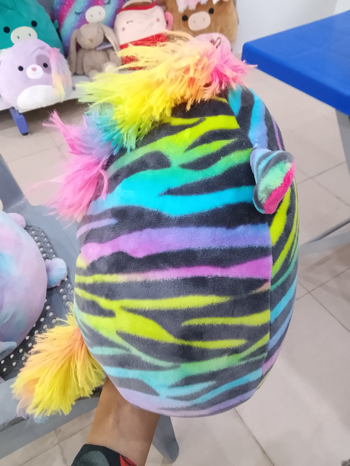 Squishmallows plush toy featuring the character Safiyah the Rainbow Zebra.