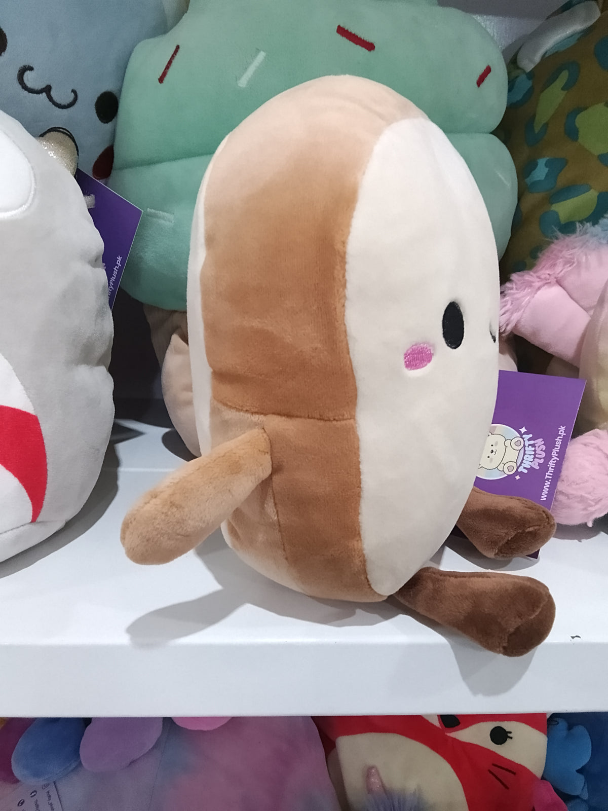 Slice of toast plush toy.