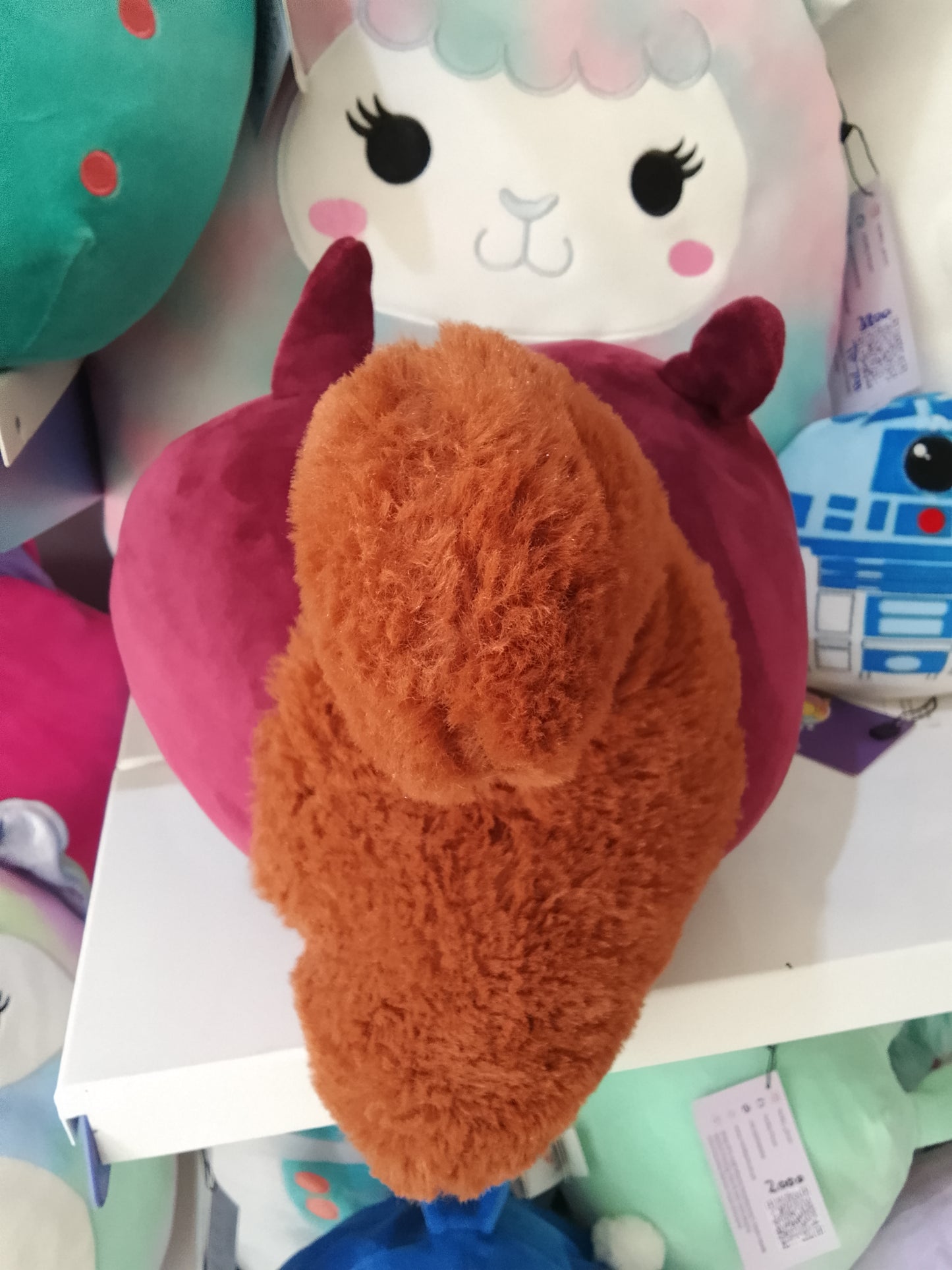 Soft stuffed animal or plush pillow.