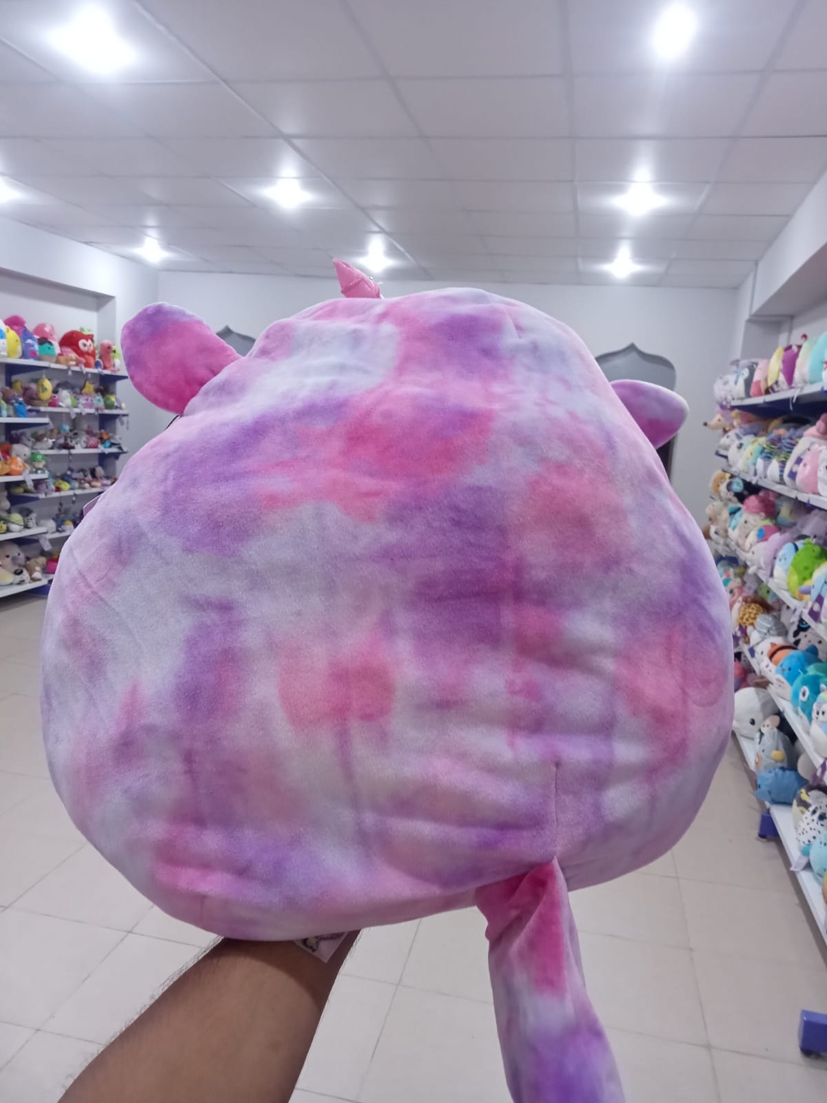 Lola the Unicorn from the Squishmallows brand.