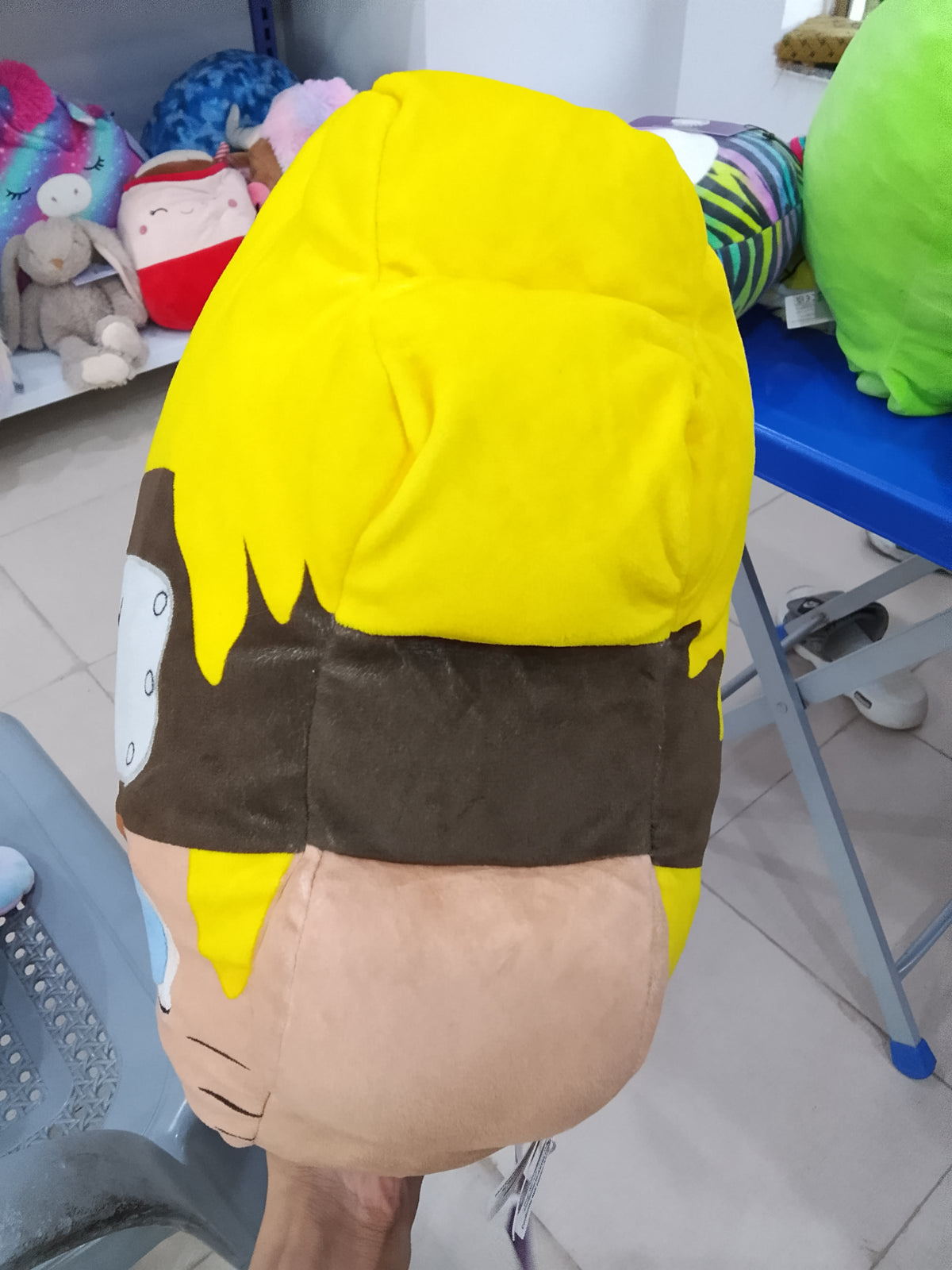 Naruto Uzumaki plush figure from the Mocchi-Mocchi series by Tomy.