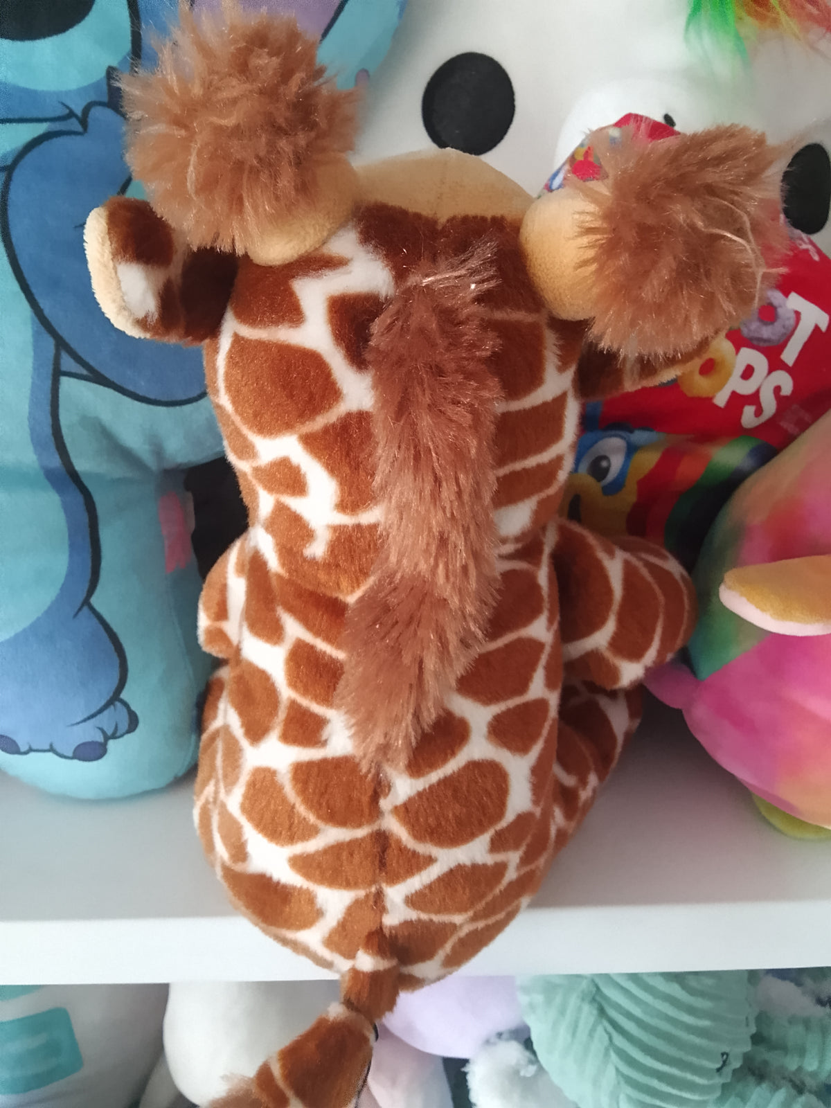 Stuffed giraffe plush toy