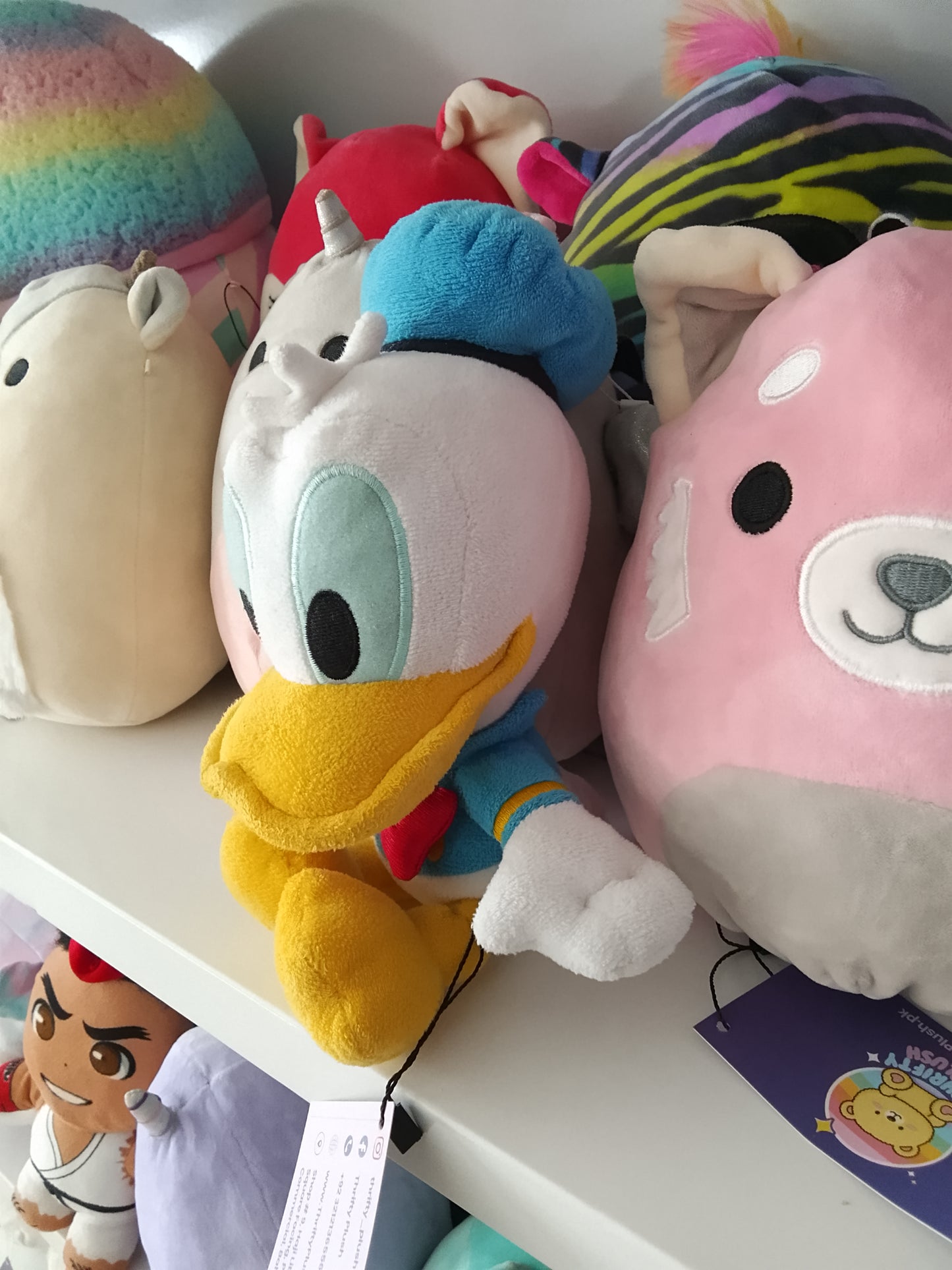 Disney Donald Duck plush toy.