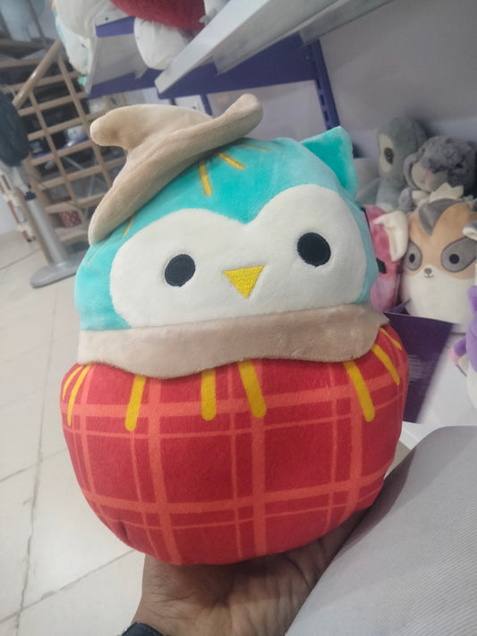 This is a Squishmallows Winston the Scarecrow Owl plush toy.