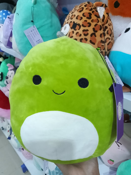 Squishmallows green dinosaur character, likely Danny or Arlie plush toy.
