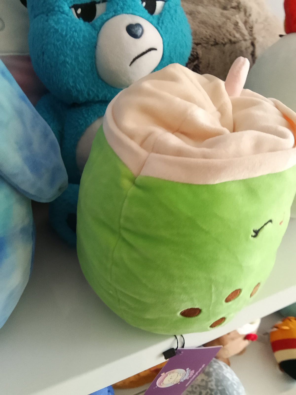 Kellytoy Squishmallows Flip-A-Mallow plush Kachina the Kiwi and Sevda the Boba Tea.