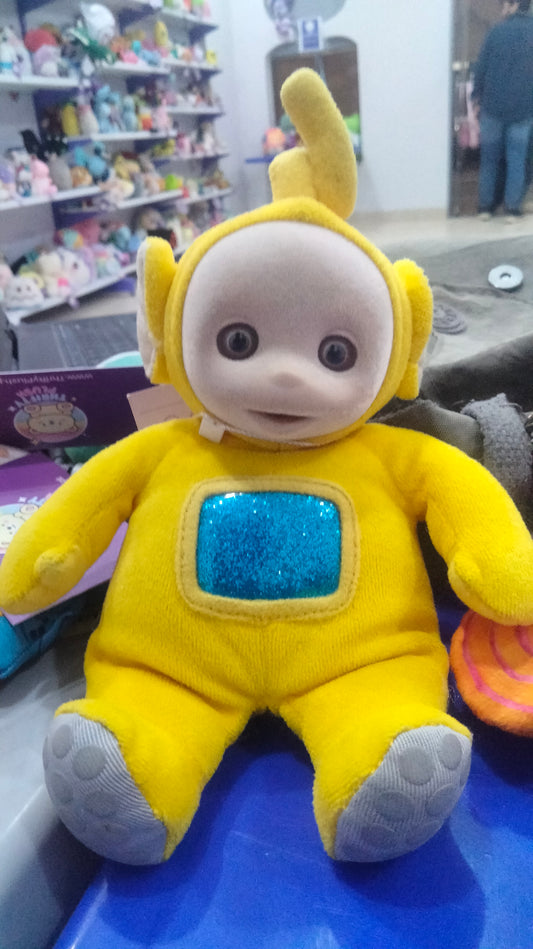yellow Teletubbies Laa-Laa plush toy.