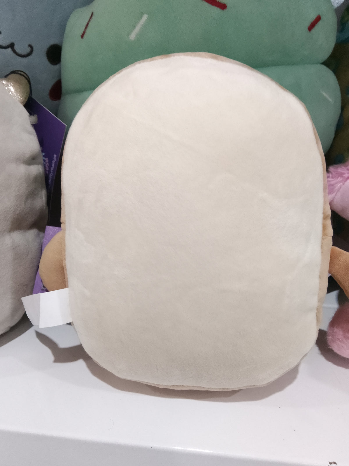 Slice of toast plush toy.