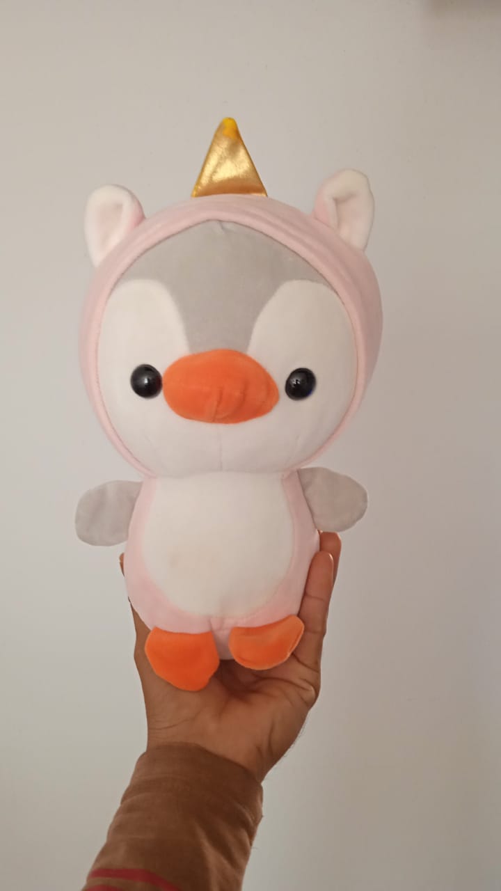 Cute Penguin Stuffed Animal Cosplay as a Pink Unicorn.