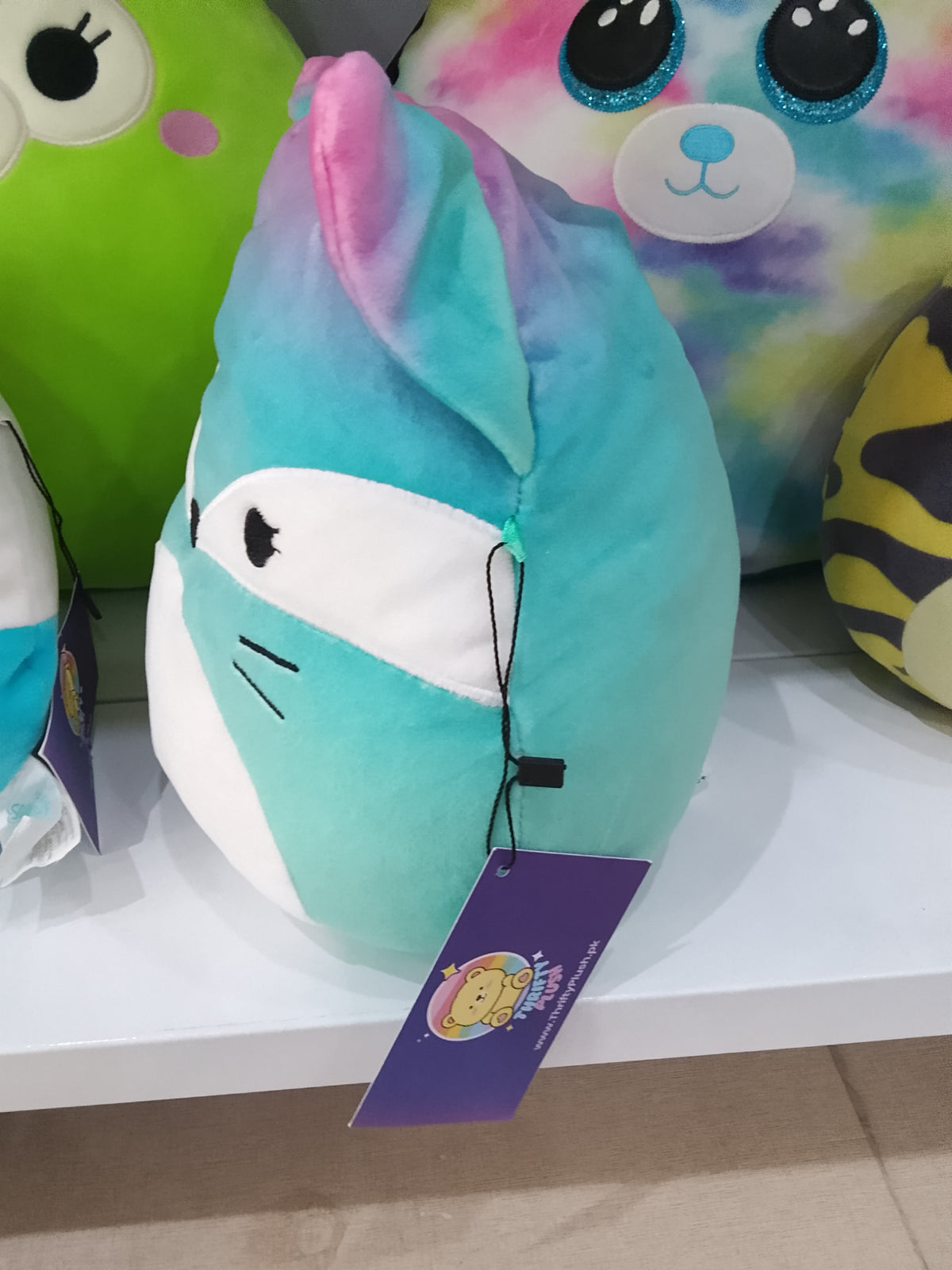 Squishmallows plush toy, specifically the character Vickie the Fox.