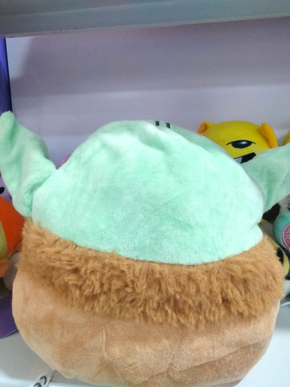 Squishmallows Star Wars plush toy featuring Baby Yoda