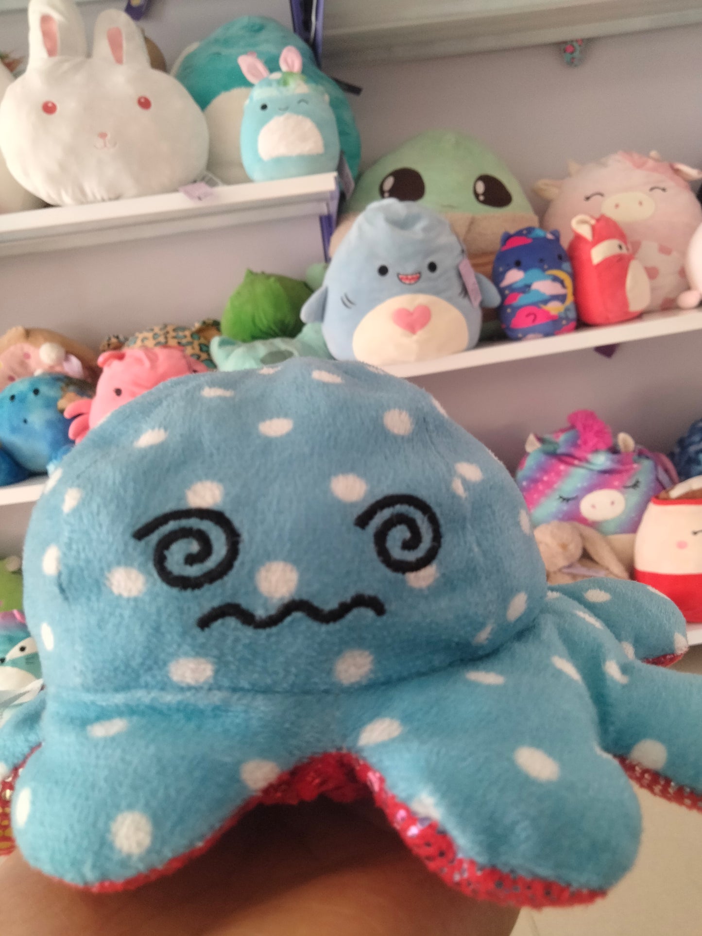 Reversible octopus plush toy,