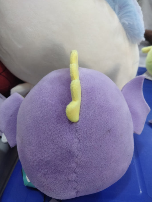 purple and yellow dragon plush toy