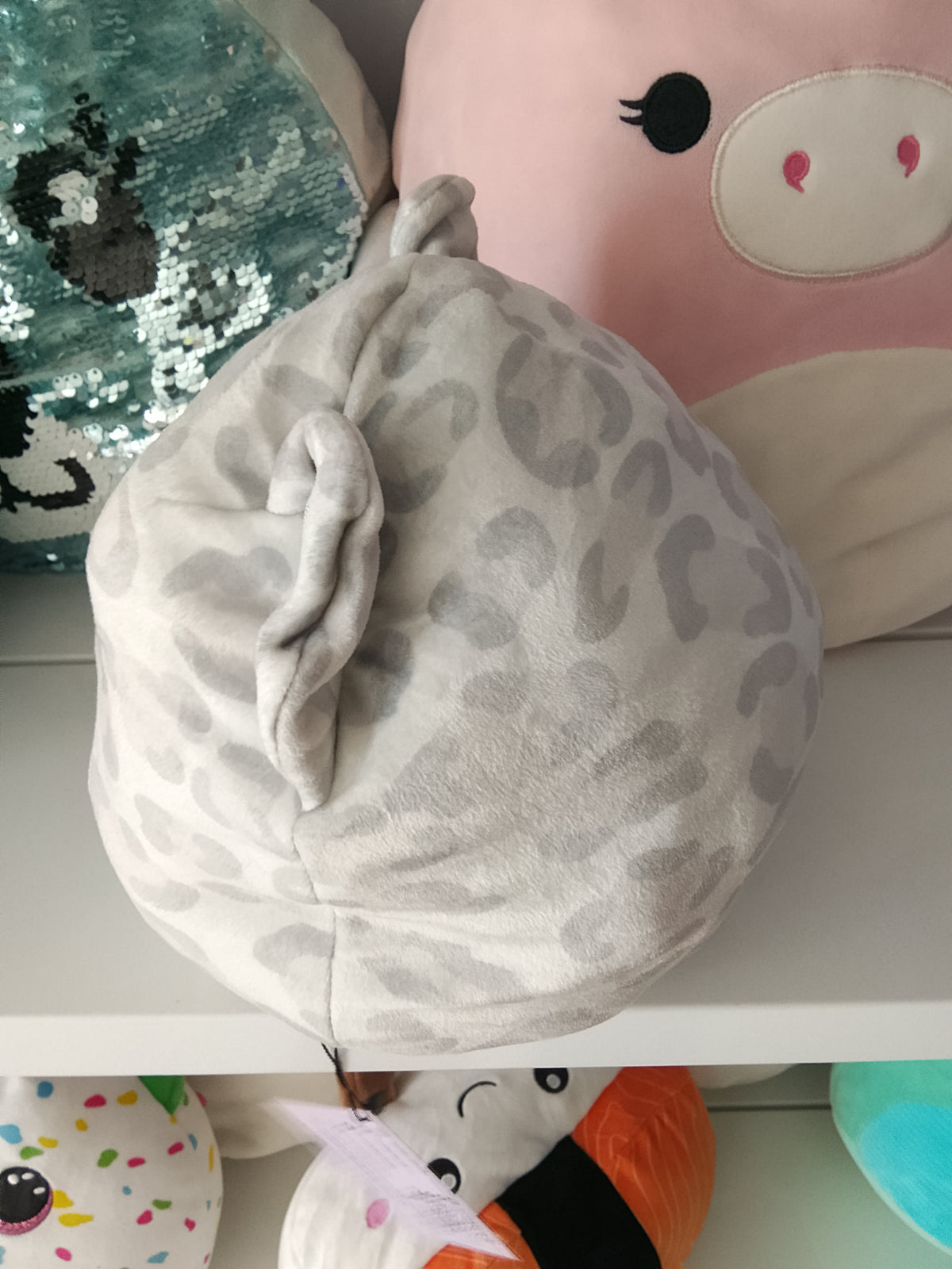 Squishmallows Flip-a-Mallow plush Dohna the Pink Panda and Mischa the Snow Leopard.