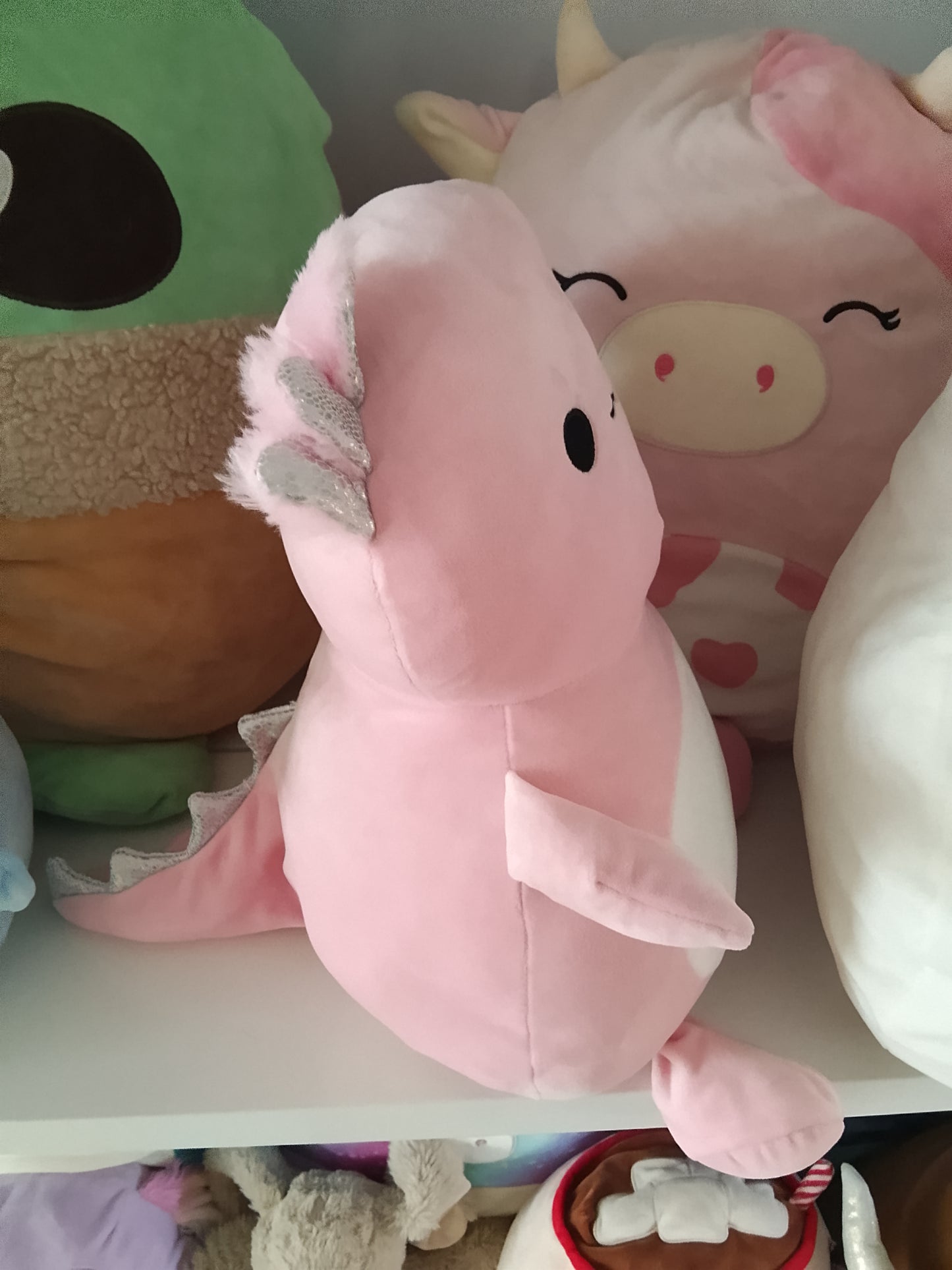 Squishmallows Archie the Axolotl plush toy.