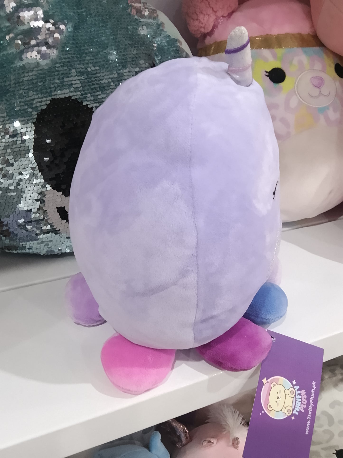 Squishmallows plush toy, specifically identified as Davina the Octocorn.