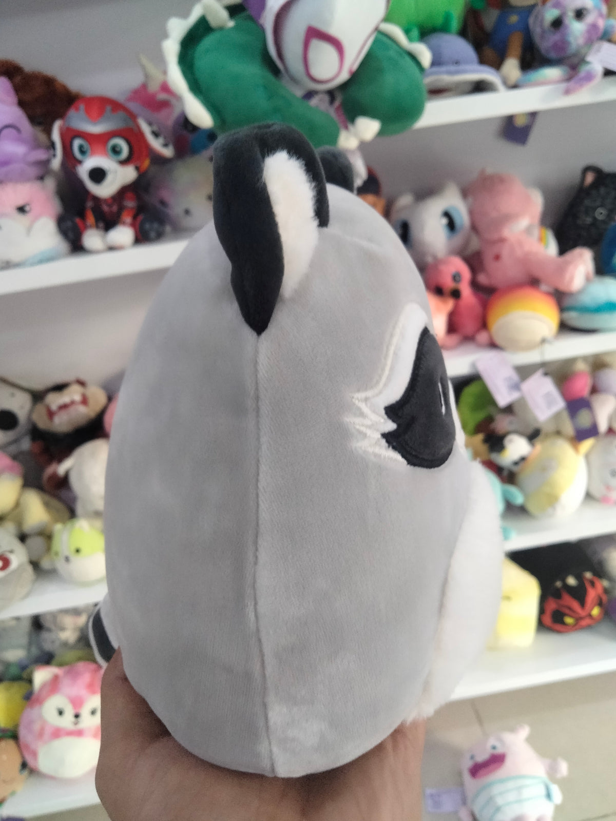 Raccoon plush toy.