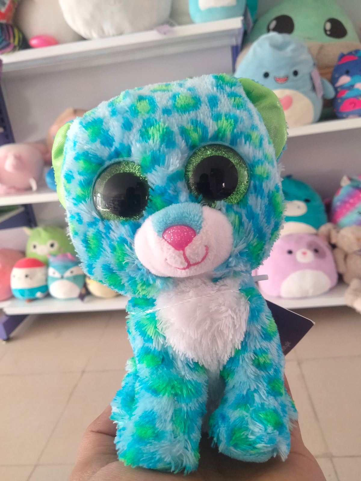 Leona" the blue and green leopard,