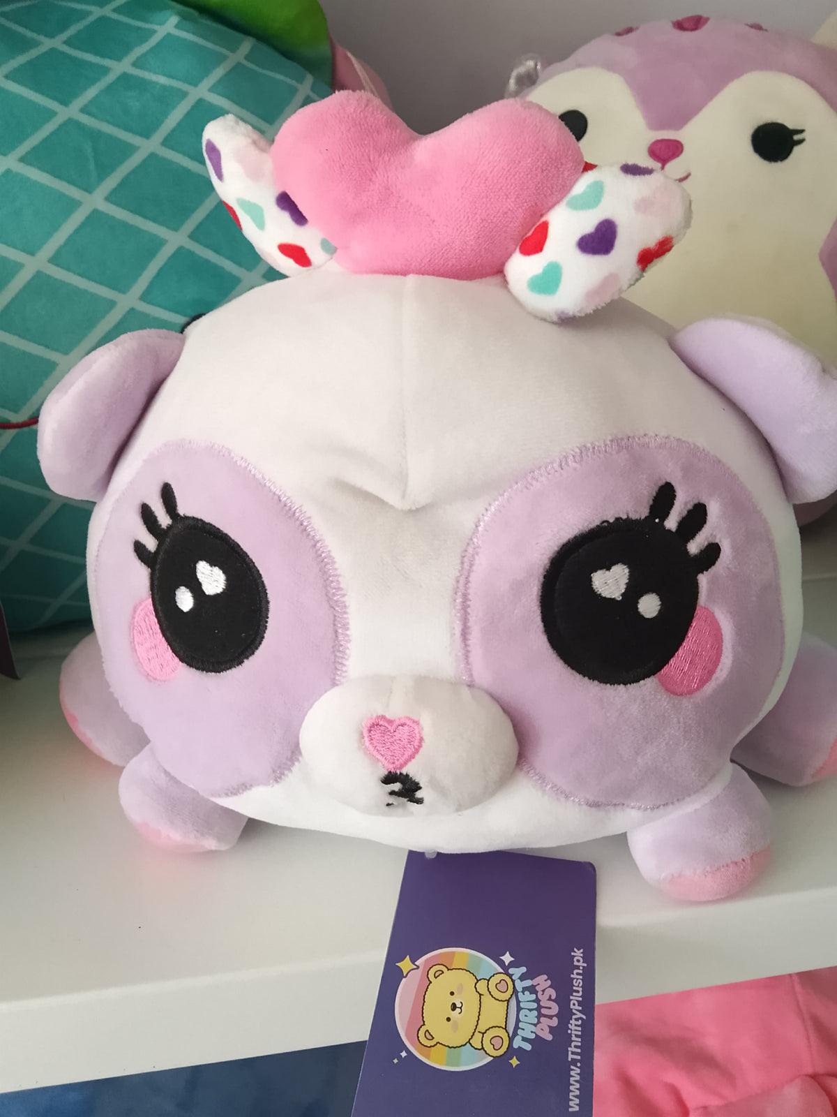 WowWee Ploosh Kissimal interactive plush toy.