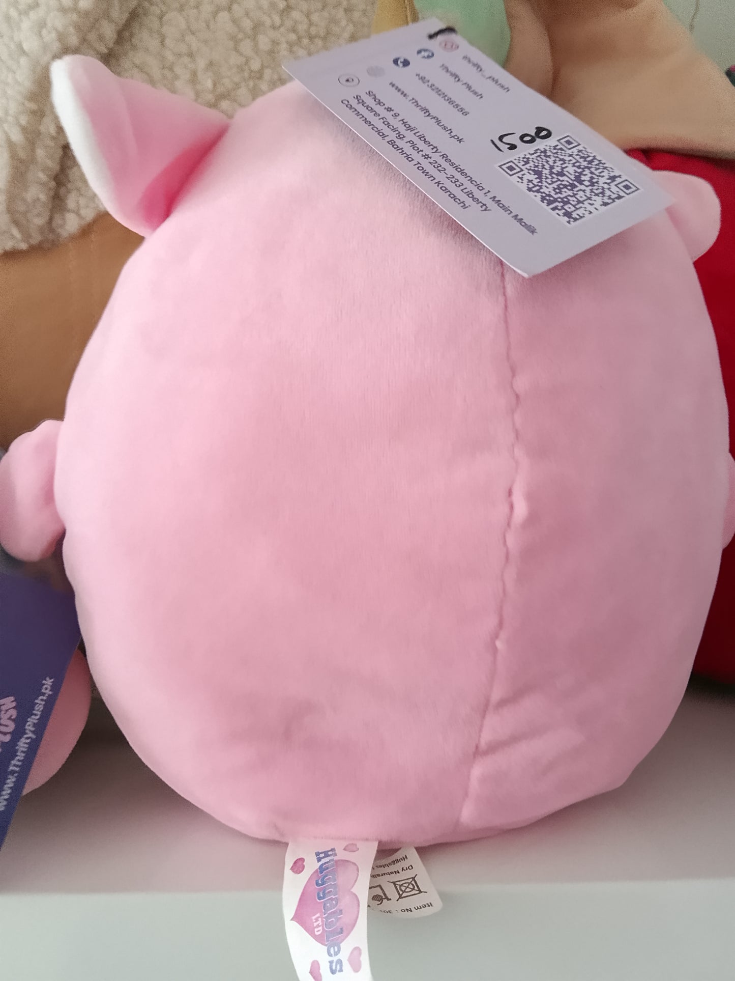 Pink unicorn plush pillow toy.