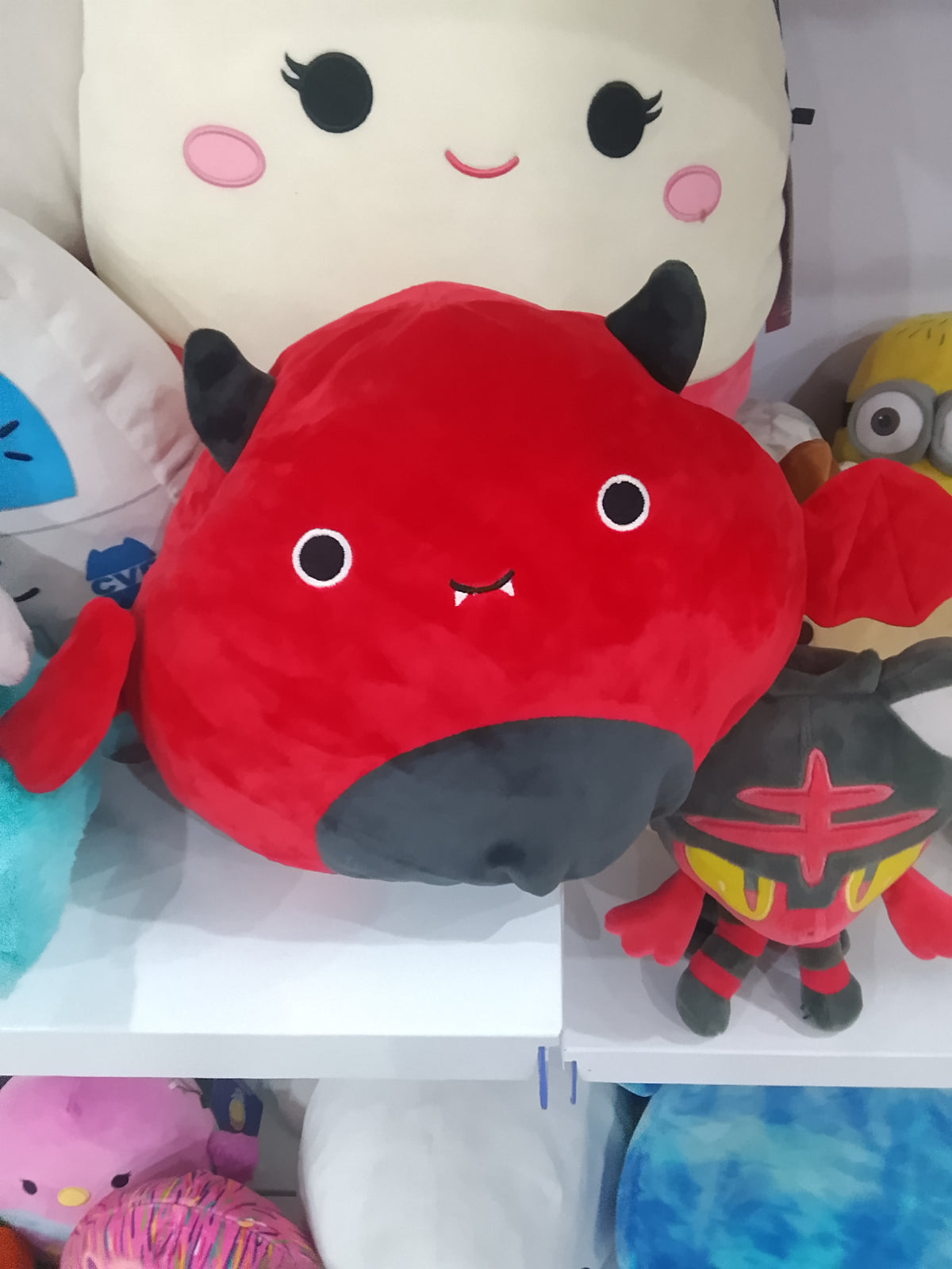 Halloween Squishmallows Flip-A-Mallow Tally the Cat plush toy.