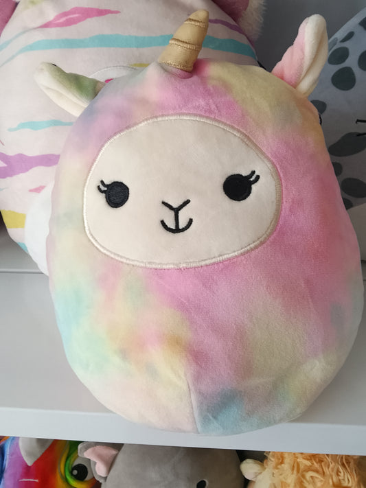 Squishmallows Lucinda the Llamacorn plush toy, featuring a rainbow tie-dye design.