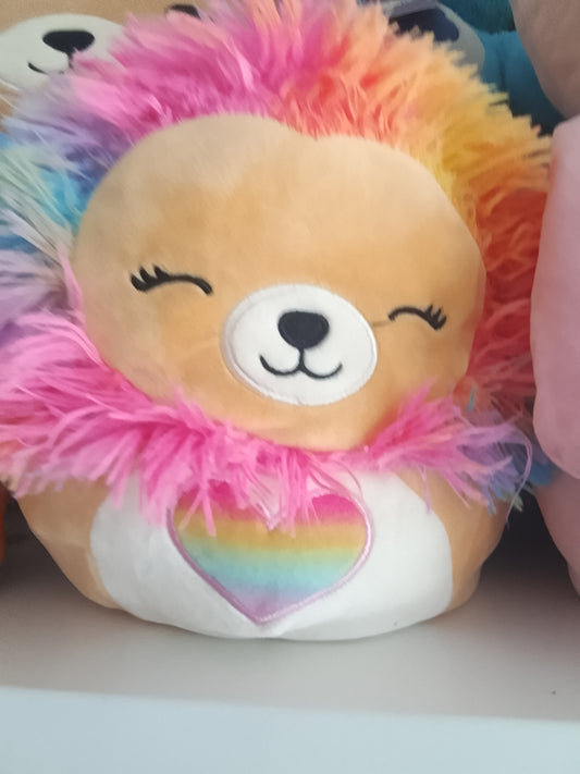 Squishmallows Lianne the Lion plush toy featuring a rainbow-colored mane.