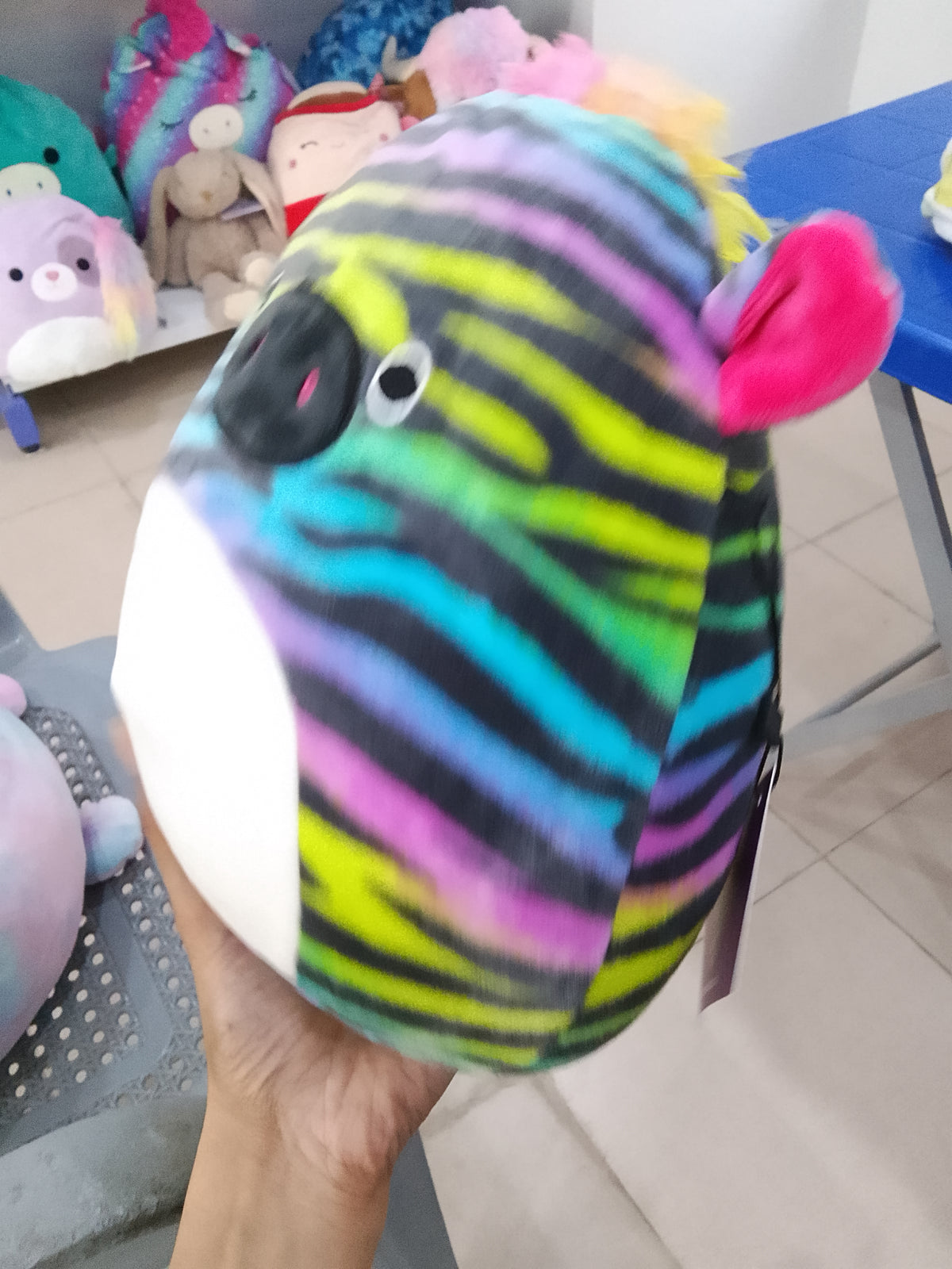 Squishmallows plush toy featuring the character Safiyah the Rainbow Zebra.