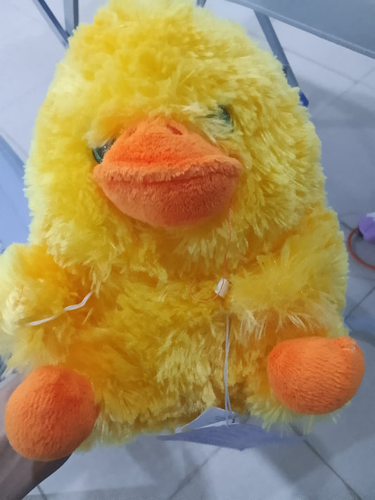 Nanco Belly Buddy yellow plush duck stuffed animal fluffy texture and orange beak and feet.