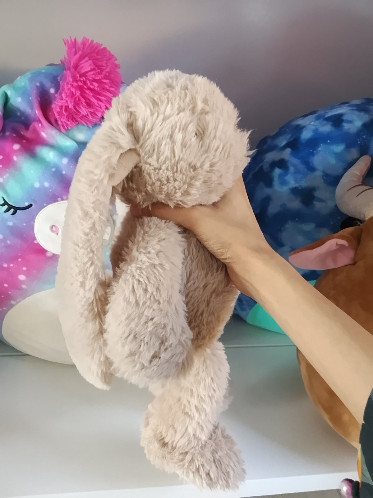 Brown bunny plush stuffed toy animal.