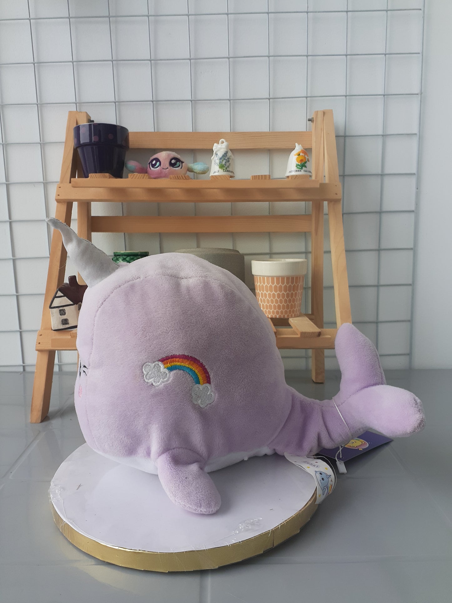 Naomi The Narwhal, A Purple Squishmallow Plush Toy.