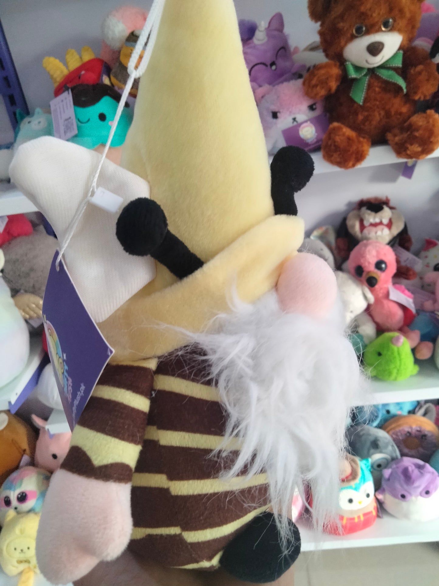 plush bumble bee gnome toy.
