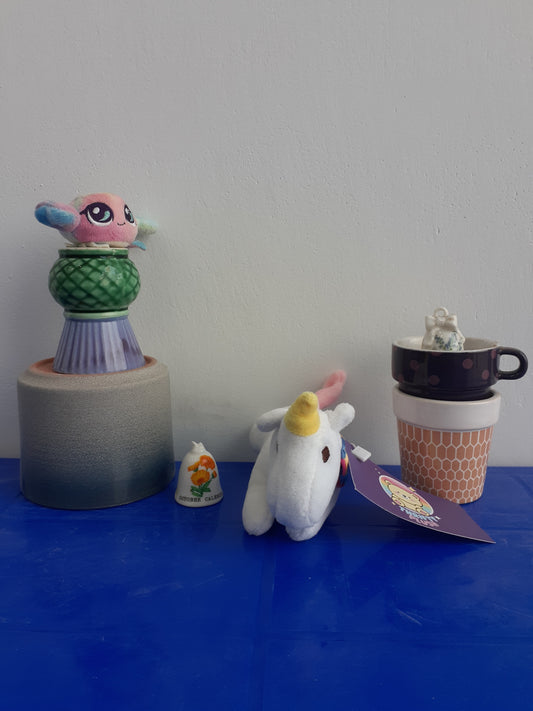 showcases a Ty Beanie Baby Plushie