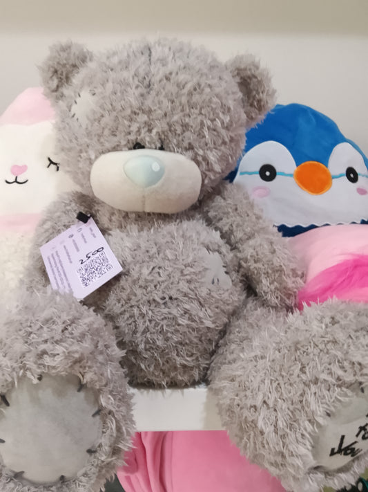 Me to You Tatty Teddy bear featuring grey fur and a signature blue nose.