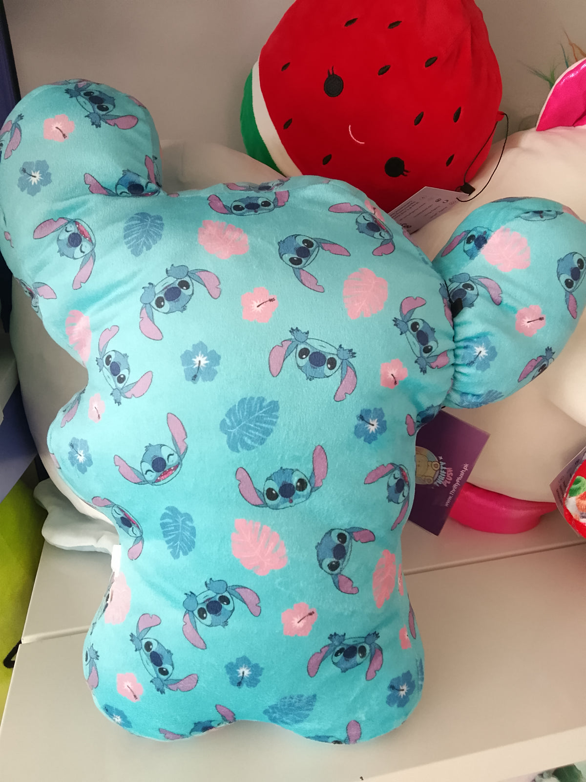 Disney Lilo & Stitch themed plush character pillow.
