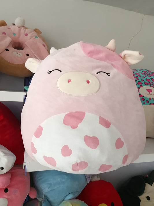 Squishmallows Clay the Pink Cow plush toy.