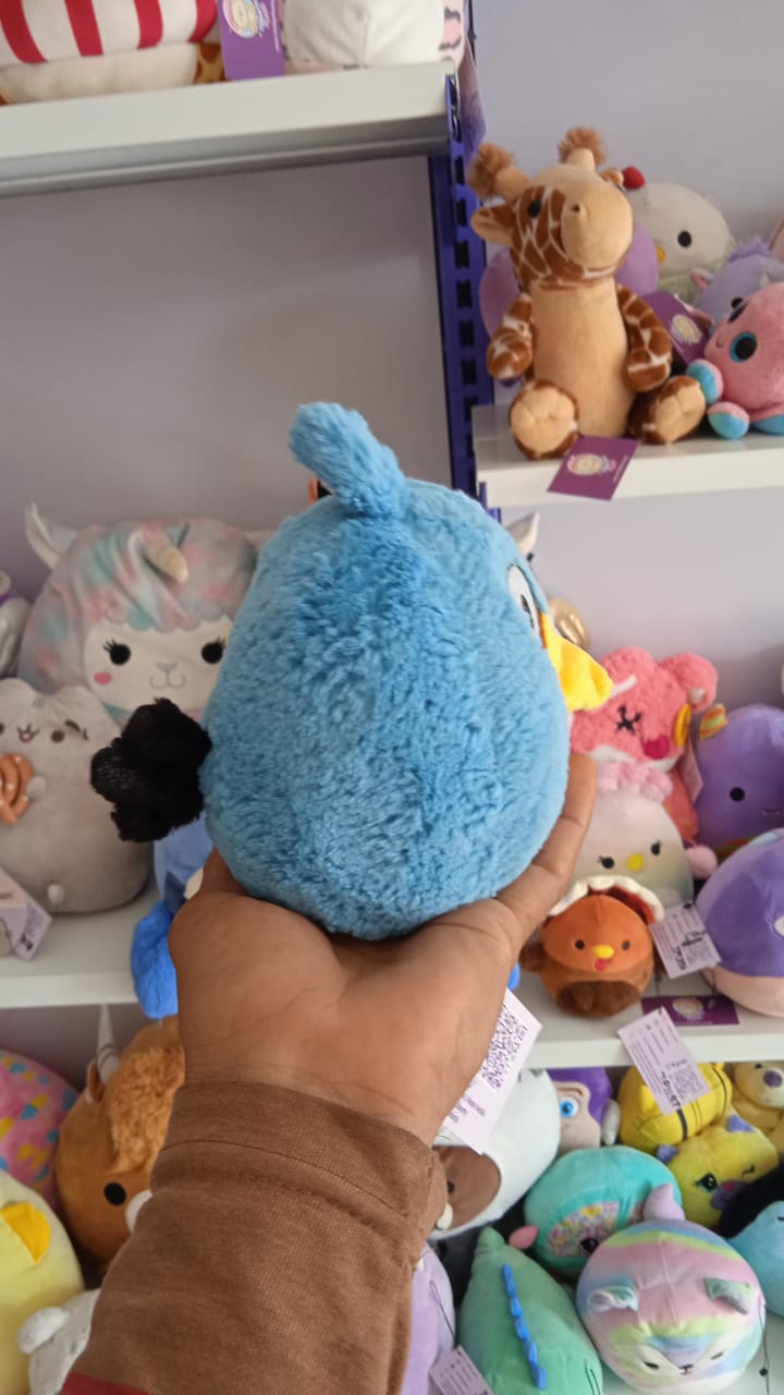 Blue Angry Birds franchise plush toy.